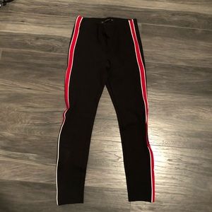 Black leggings with red stripe